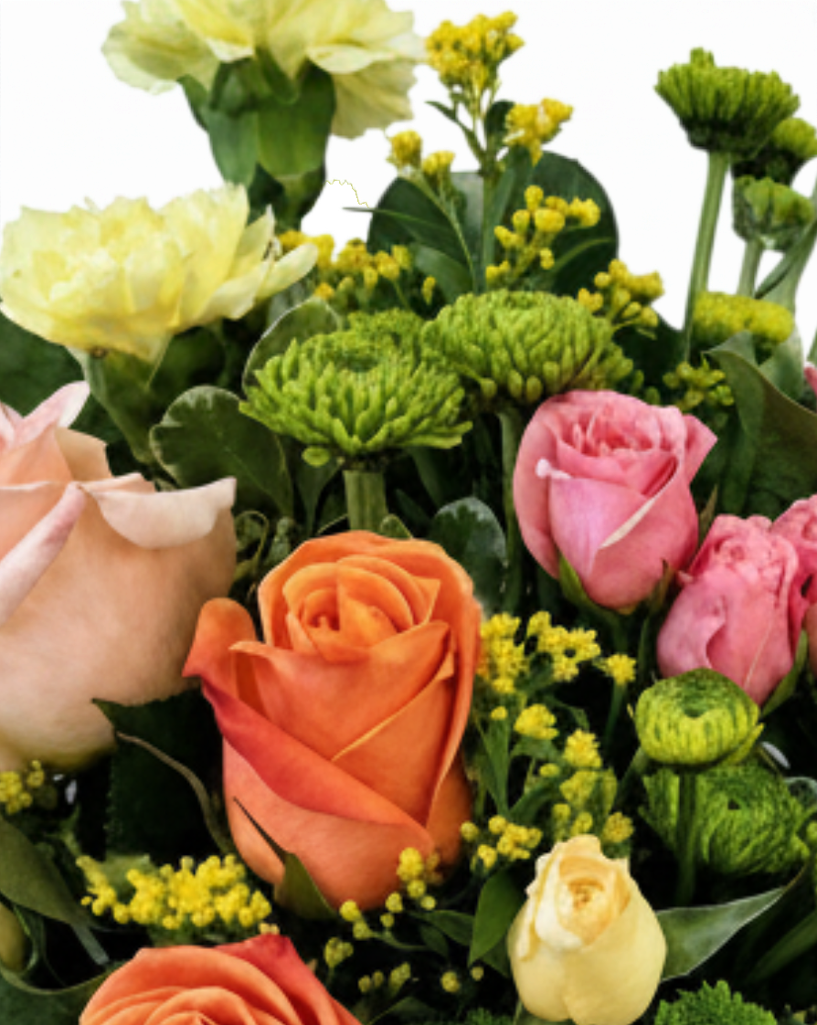 Lakewood Florist Citrus Splash bouquet featuring orange, yellow, and green flowers in a glass vase.