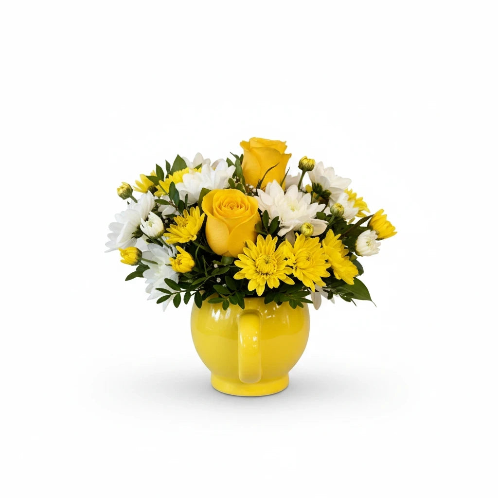 Lakewood Florist yellow smiley face mug filled with a cheerful bouquet of yellow roses and white daisies.